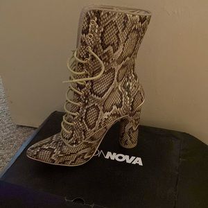 FashionNova snake skin boots. Size 10. Never worn!!!